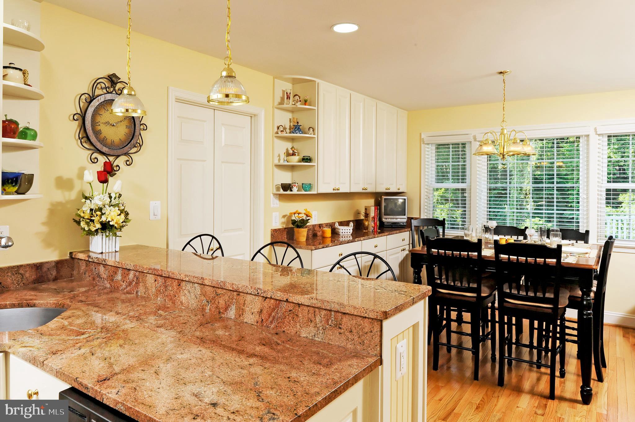 8219 Riding Ridge Place McLean, VA 22102 - Photo 31 of 79 KITCHEN WITH ADDITIONAL CABS IN BREAKFAST AREA