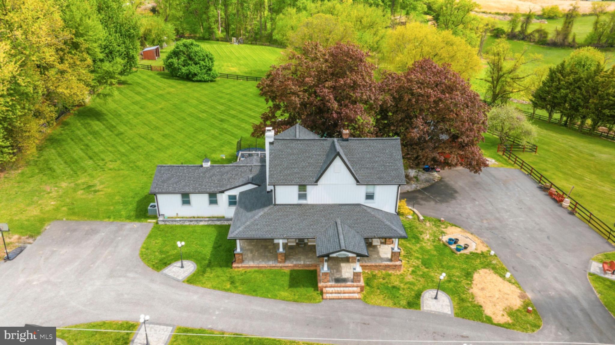 3524 Blenheim Road Phoenix, MD 21131 - Photo 54 of 61 an aerial view of a house with a garden and swimming pool
