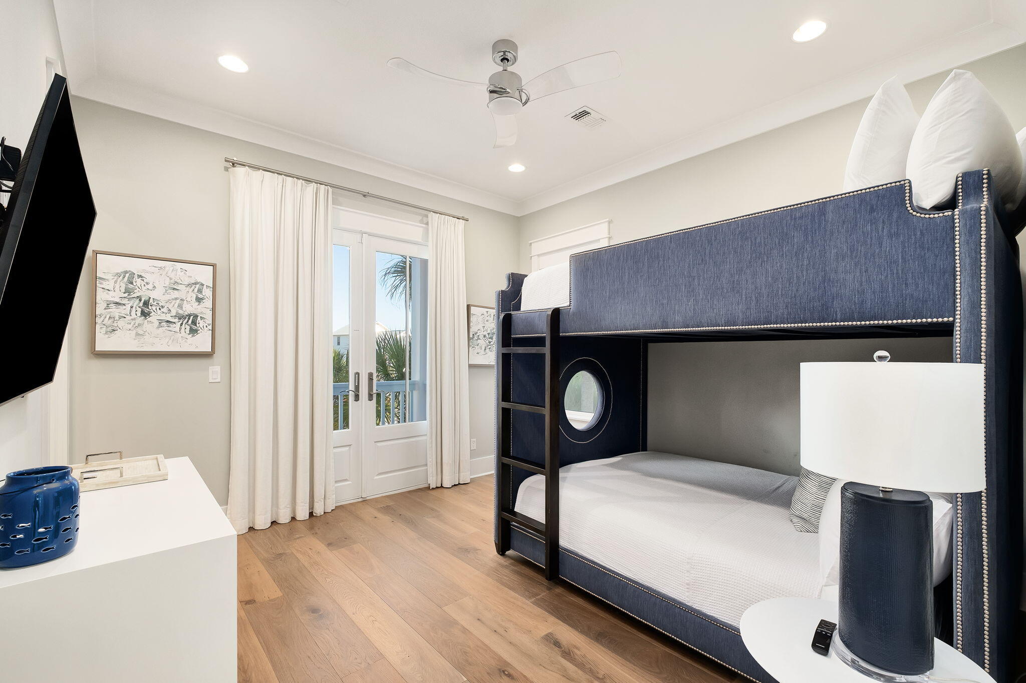 260 Magnolia Street Santa Rosa Beach, FL 32459 - Photo 12 of 19 a bedroom with a bed and a flat screen tv