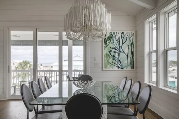 a view of a dining room with furniture window and outside view