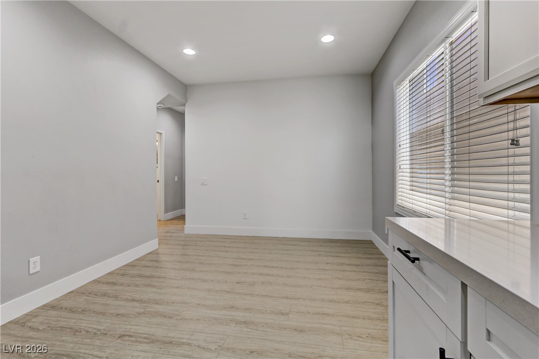 2835 Strathallan Avenue Henderson, NV 89044 - Photo 14 of 64 Unfurnished room with recessed lighting and light wood-type flooring