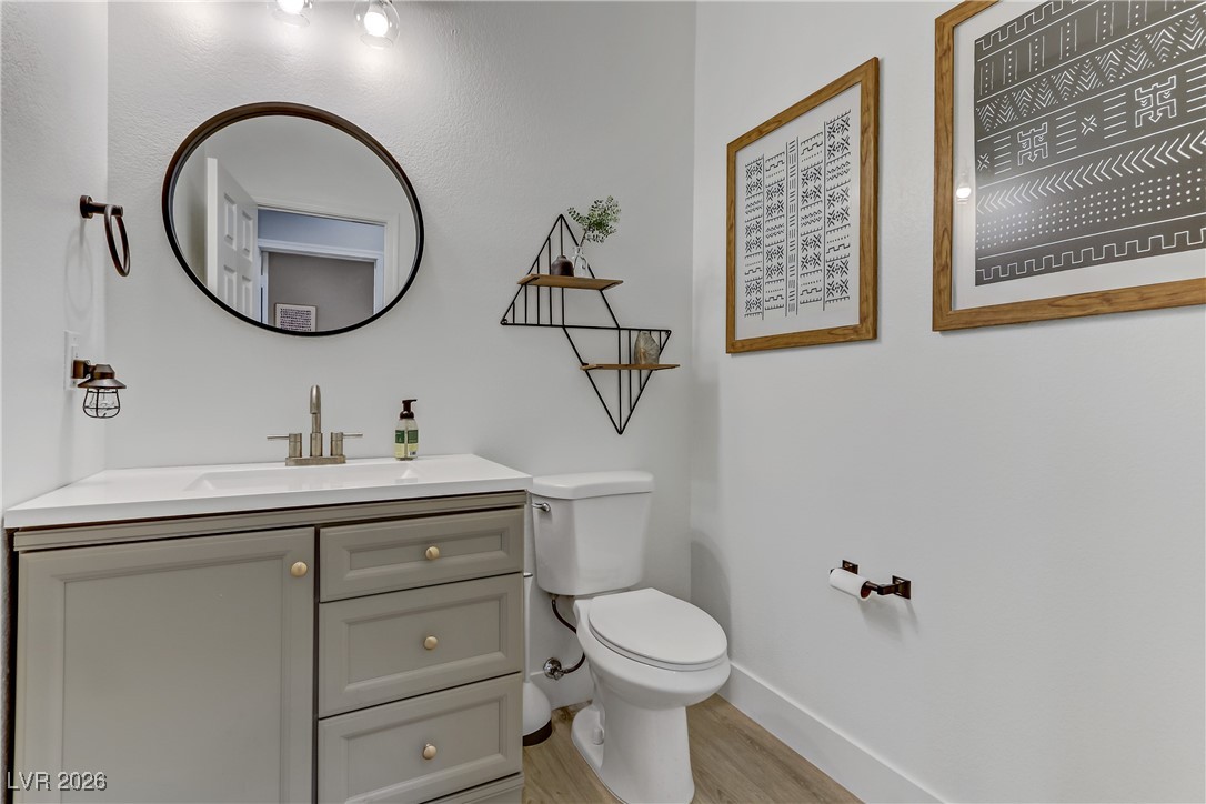 2835 Strathallan Avenue Henderson, NV 89044 - Photo 16 of 64 Bathroom with vanity and light wood finished floors
