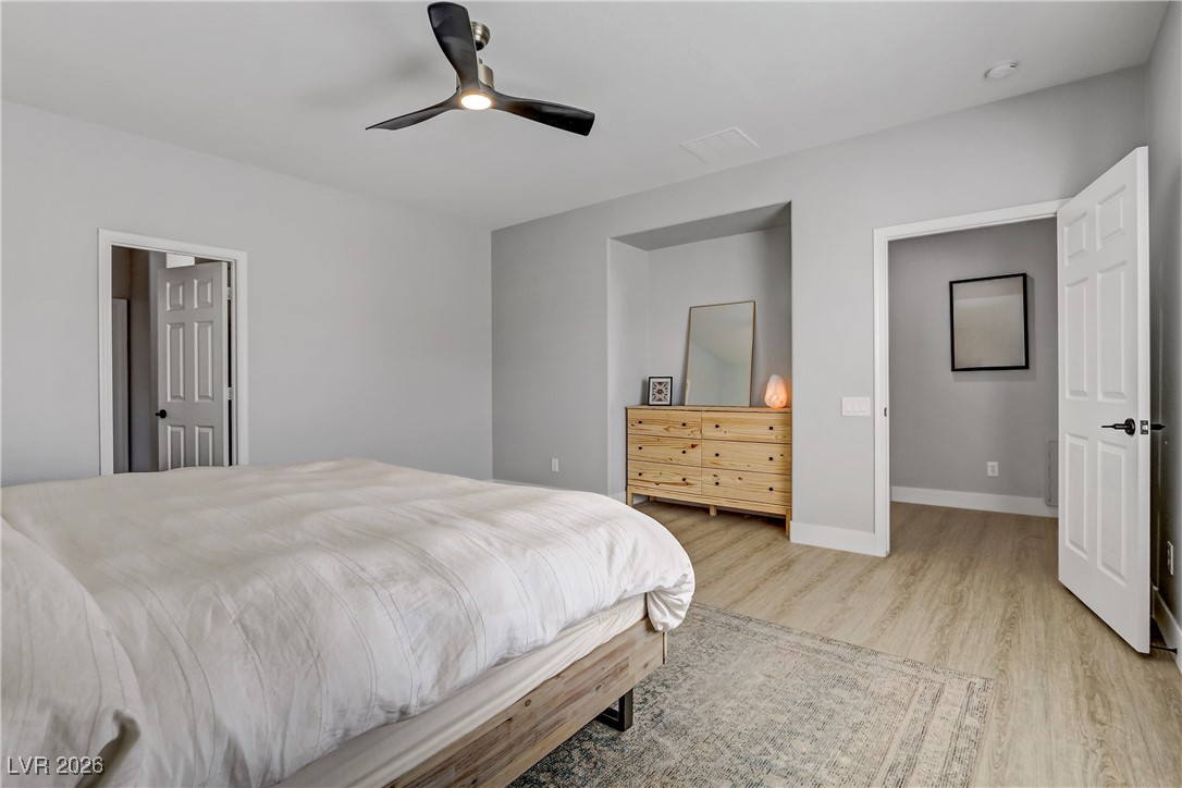 2835 Strathallan Avenue Henderson, NV 89044 - Photo 19 of 64 Bedroom featuring light wood-style flooring and ceiling fan