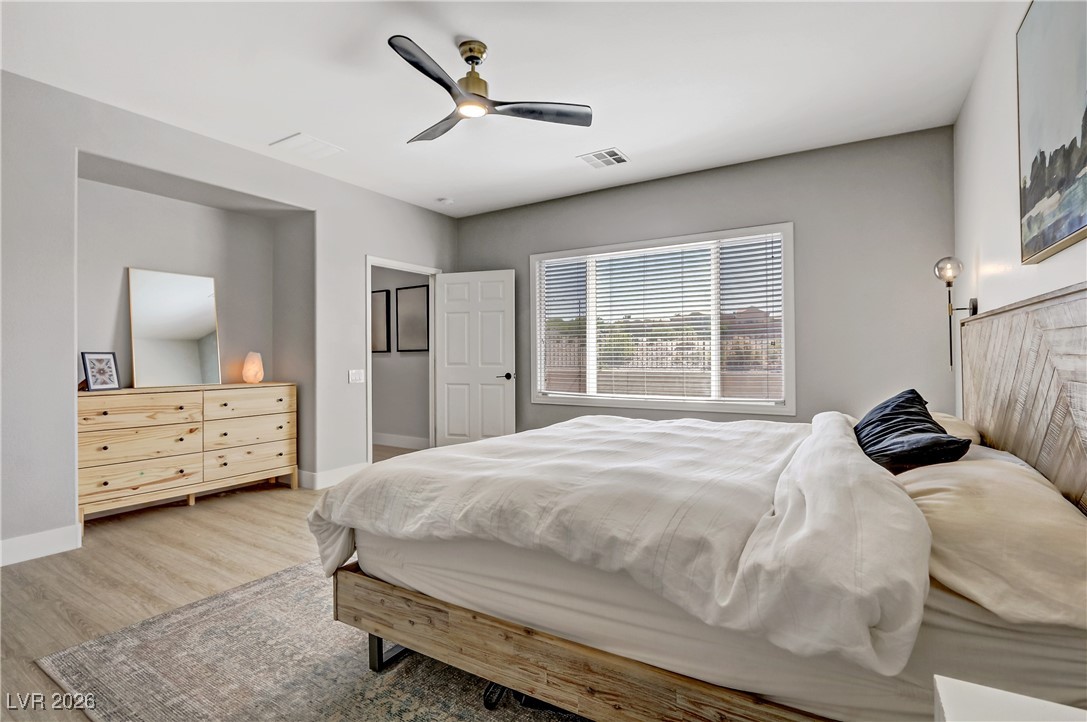 2835 Strathallan Avenue Henderson, NV 89044 - Photo 20 of 64 Bedroom with wood finished floors and ceiling fan