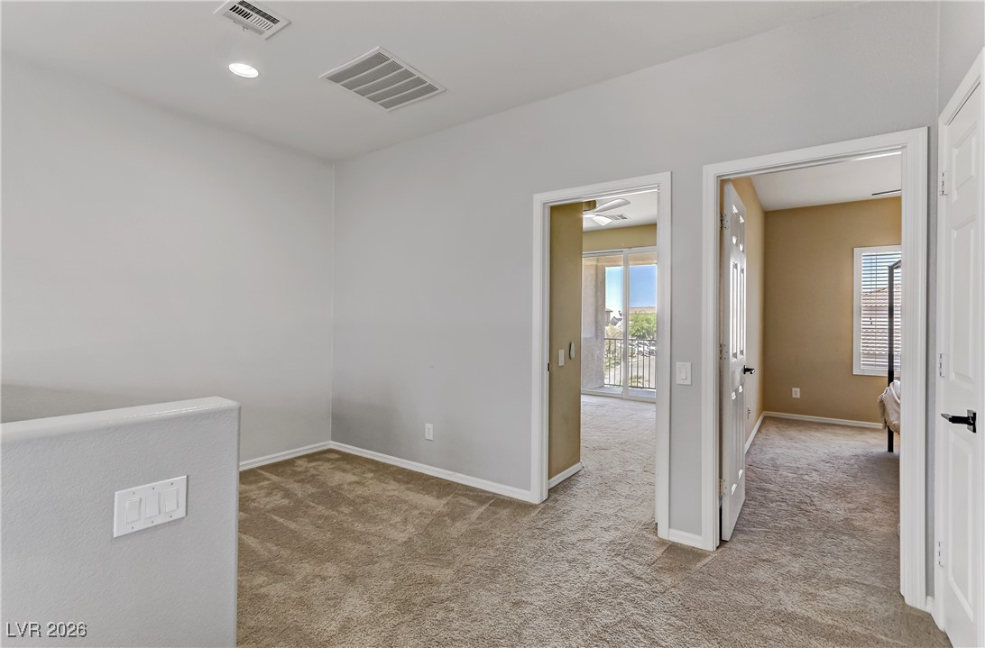 2835 Strathallan Avenue Henderson, NV 89044 - Photo 31 of 64 Spare room featuring light carpet and recessed lighting