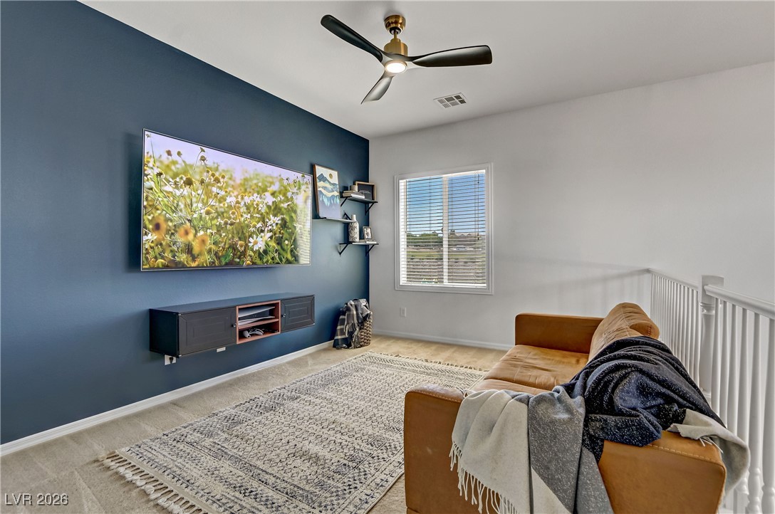 2835 Strathallan Avenue Henderson, NV 89044 - Photo 36 of 64 Sitting room featuring ceiling fan and carpet