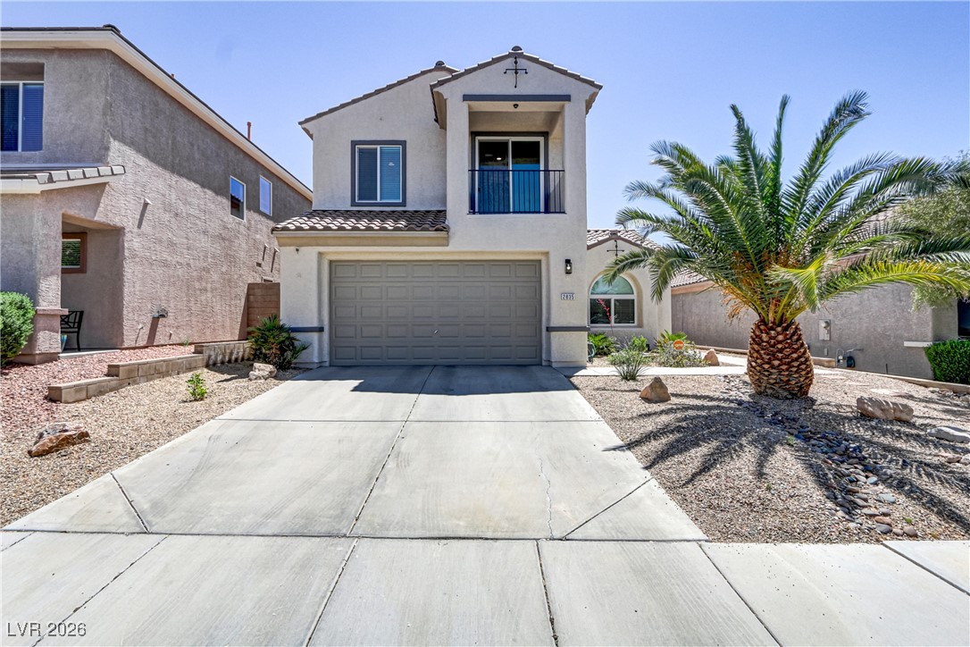2835 Strathallan Avenue Henderson, NV 89044 - Photo 43 of 64 Mediterranean / spanish home with a balcony, a garage, driveway, stucco siding, and a tile roof