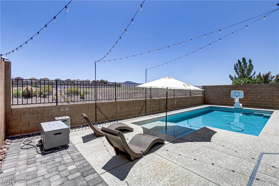 2835 Strathallan Avenue Henderson, NV 89044 - Photo 44 of 64 View of swimming pool featuring a patio and a fenced backyard