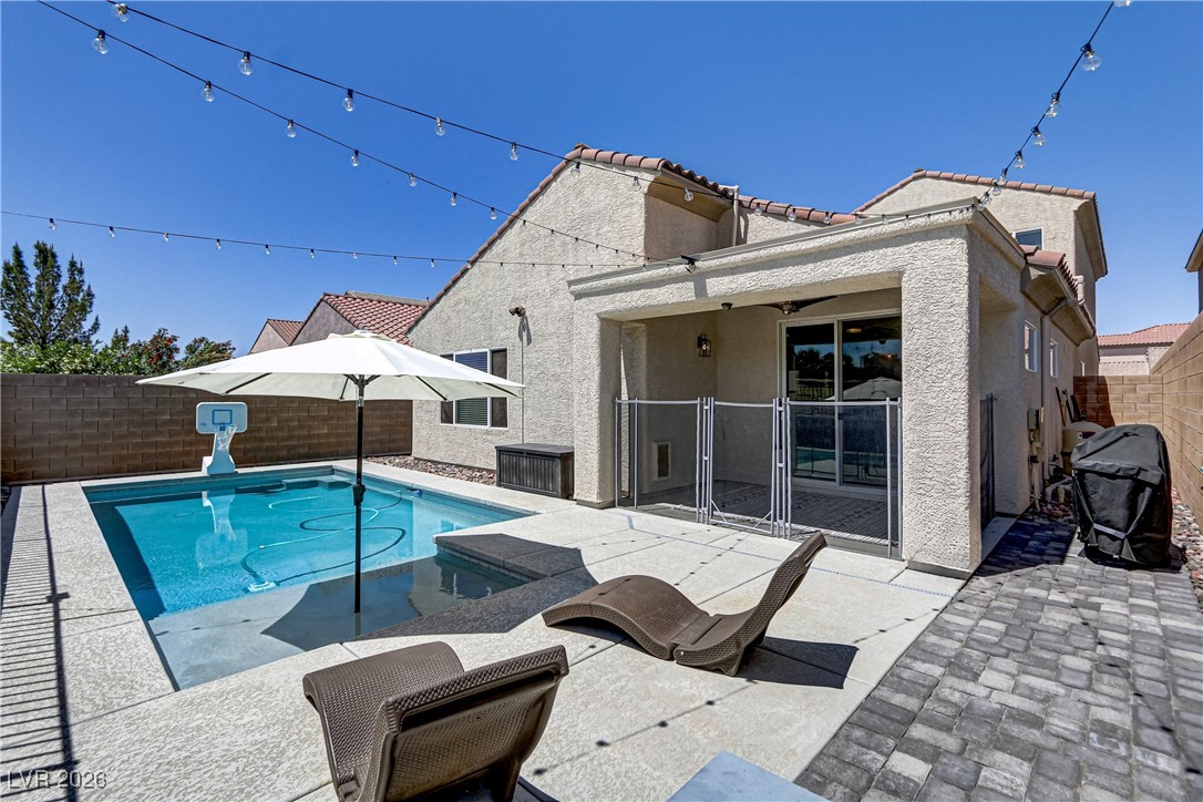 2835 Strathallan Avenue Henderson, NV 89044 - Photo 45 of 64 View of swimming pool with a fenced backyard, a patio, and a grill