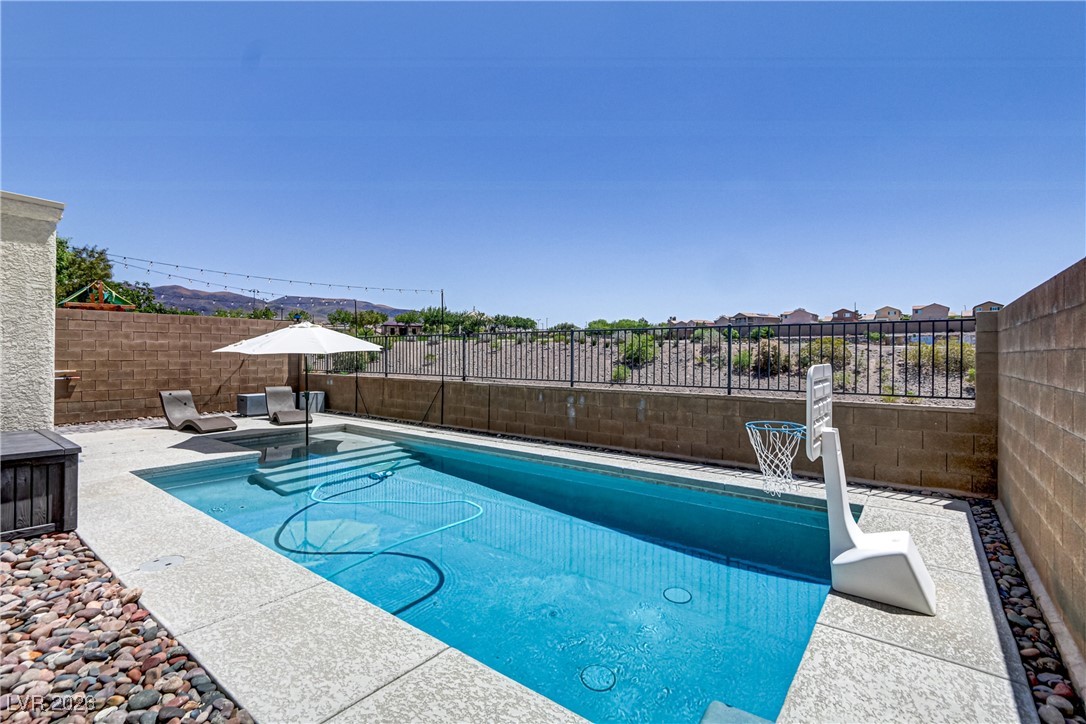2835 Strathallan Avenue Henderson, NV 89044 - Photo 47 of 64 View of pool with a patio and a fenced backyard
