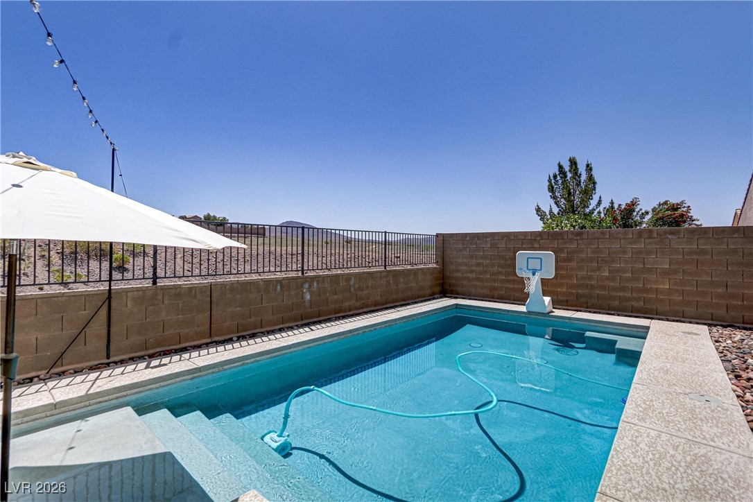 2835 Strathallan Avenue Henderson, NV 89044 - Photo 48 of 64 View of swimming pool featuring a fenced backyard
