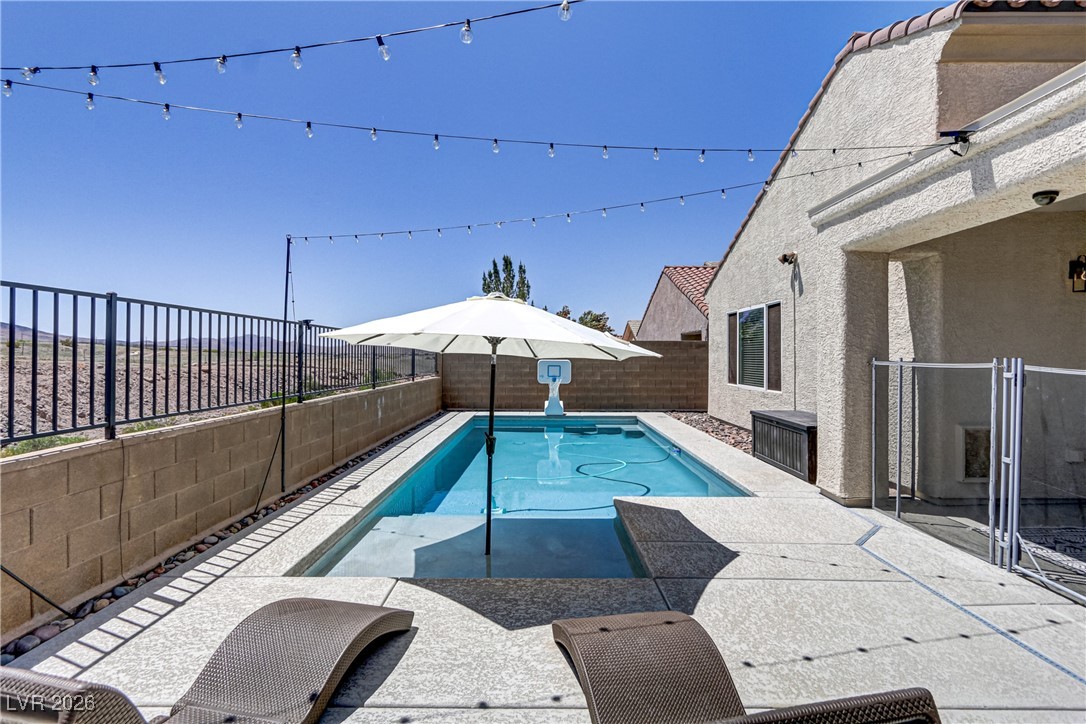 2835 Strathallan Avenue Henderson, NV 89044 - Photo 49 of 64 View of pool with a fenced backyard and a patio