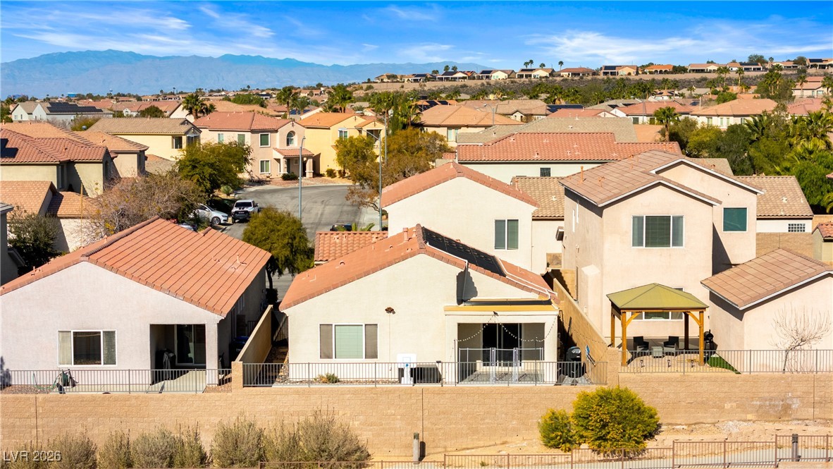 2835 Strathallan Avenue Henderson, NV 89044 - Photo 55 of 64 Aerial perspective of suburban area featuring a mountainous background