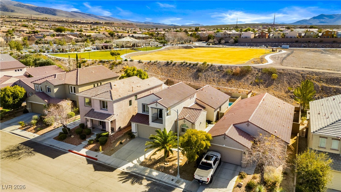 2835 Strathallan Avenue Henderson, NV 89044 - Photo 60 of 64 Aerial view of residential area with a mountain backdrop