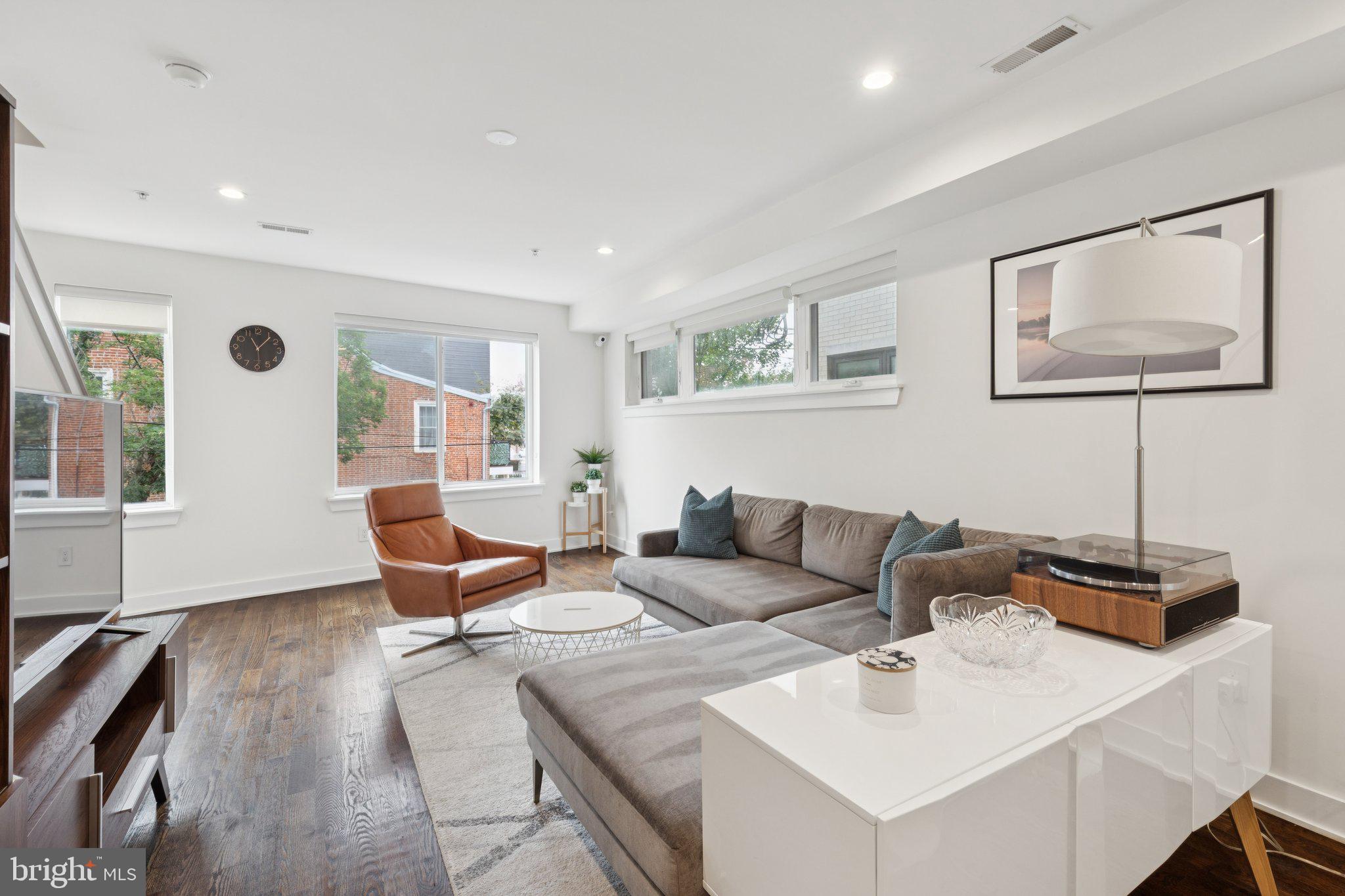 1022 South 2nd Street, Unit 2 Philadelphia, PA 19147 - Photo 11 of 46 a living room with furniture and a window