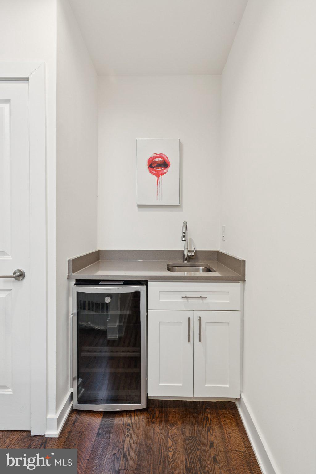 1022 South 2nd Street, Unit 2 Philadelphia, PA 19147 - Photo 36 of 46 a view of a stove top oven and cabinets
