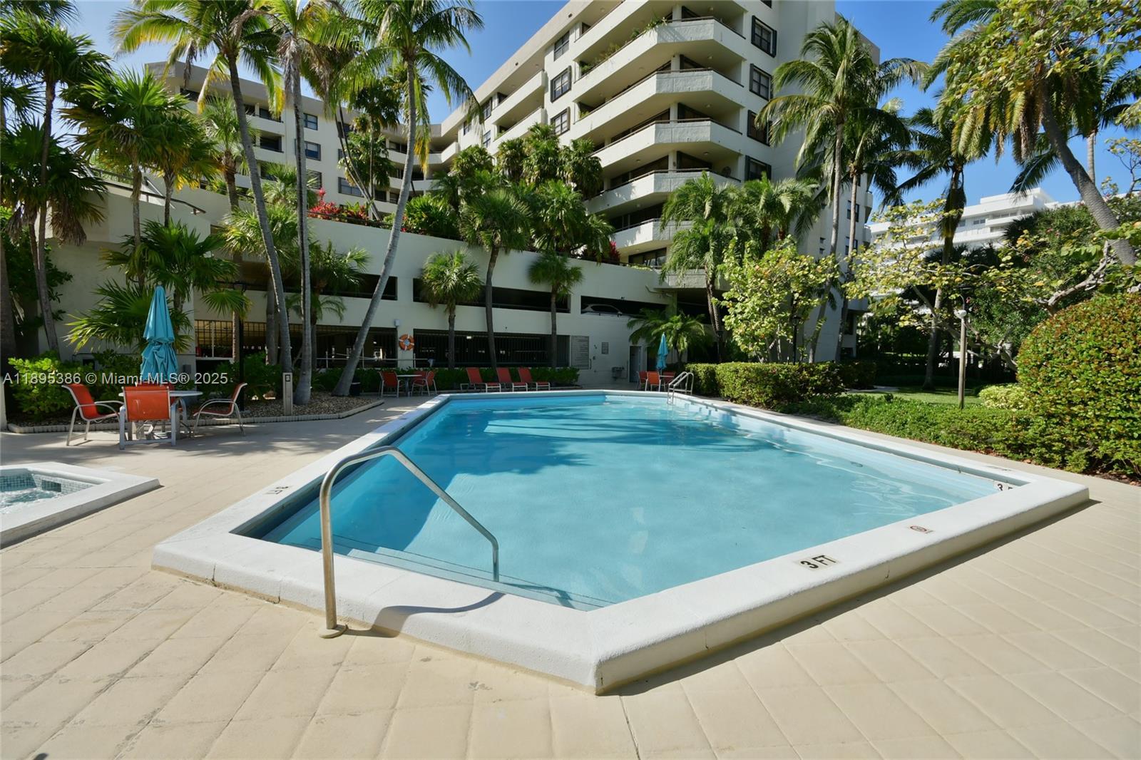 170 Ocean Ln Drive, Unit 311 Key Biscayne, FL 33149 - Photo 2 of 32 a view of a backyard