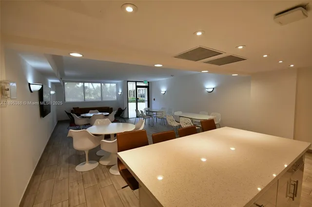 a view of a building with a yard