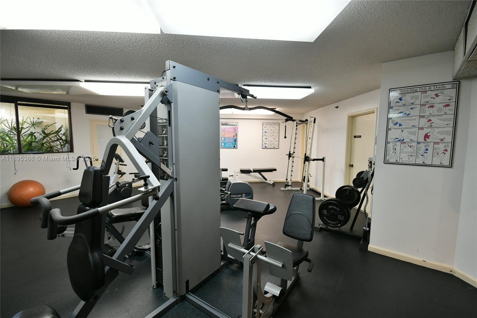170 Ocean Ln Drive, Unit 311 Key Biscayne, FL 33149 - Photo 25 of 32 a view of a room with gym equipment