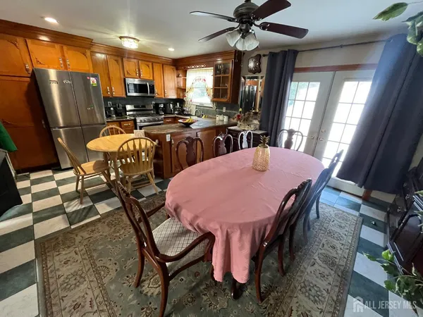 a view of a dining room with furniture