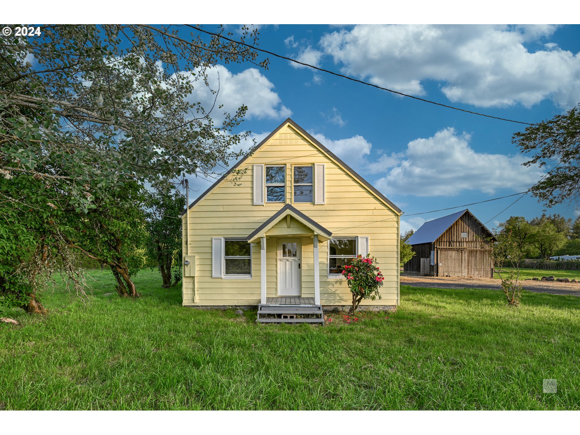 31262 Southeast Kelso Road Boring, OR 97009 - Photo 2 of 48 a front view of a house with a yard