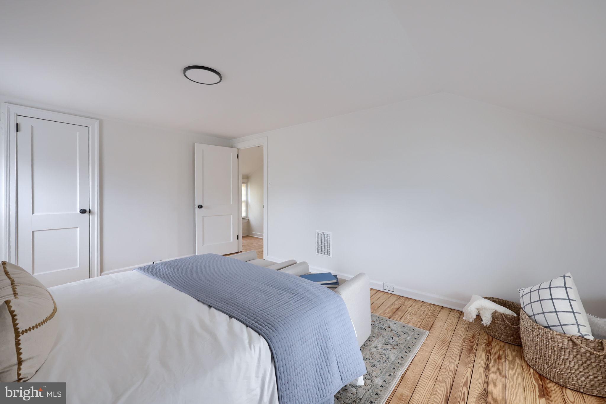 1297 Graystone Road Manheim, PA 17545 - Photo 16 of 29 a bedroom with a bed and wooden floor