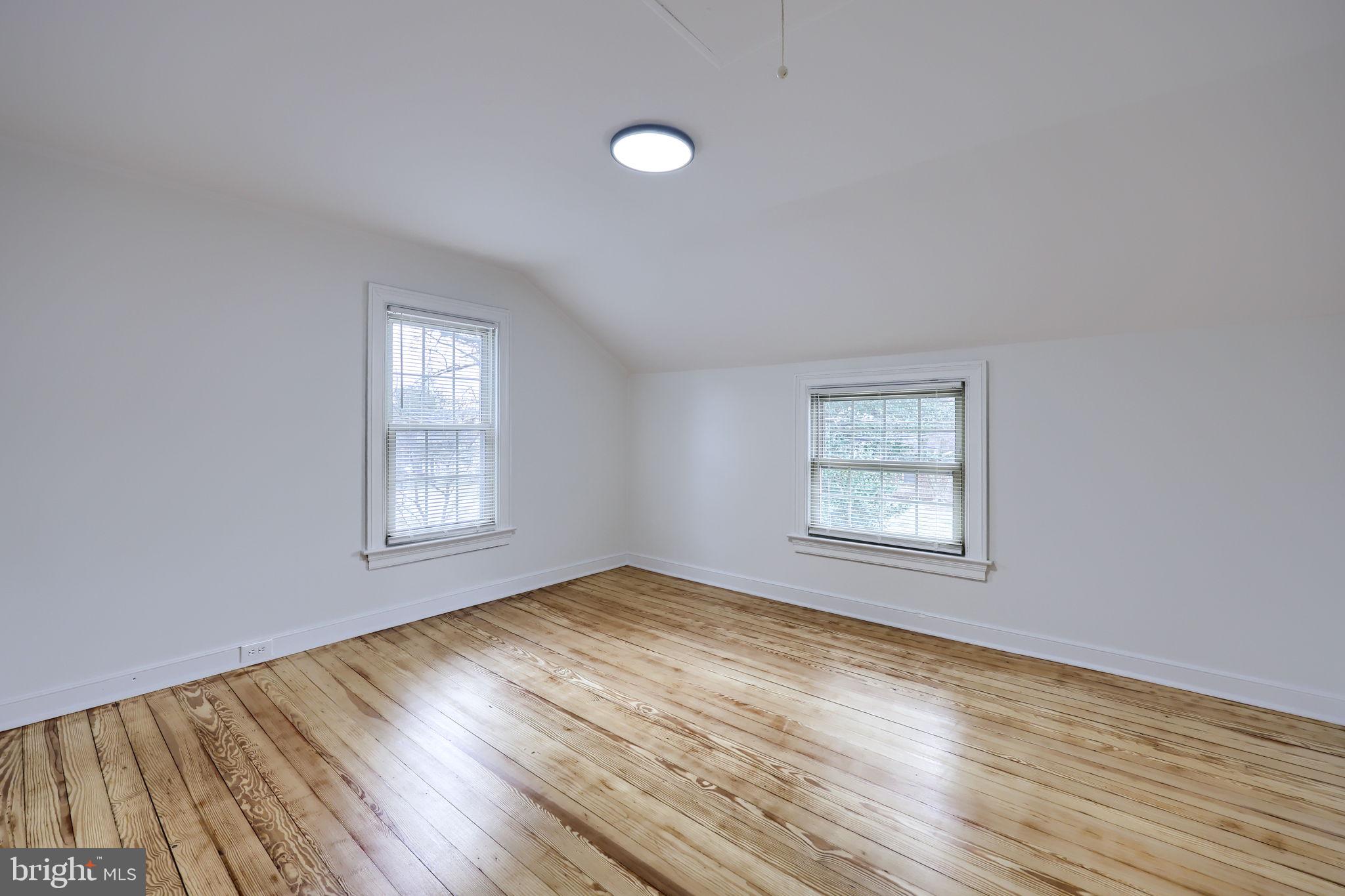1297 Graystone Road Manheim, PA 17545 - Photo 17 of 29 wooden floor in an empty room with a window