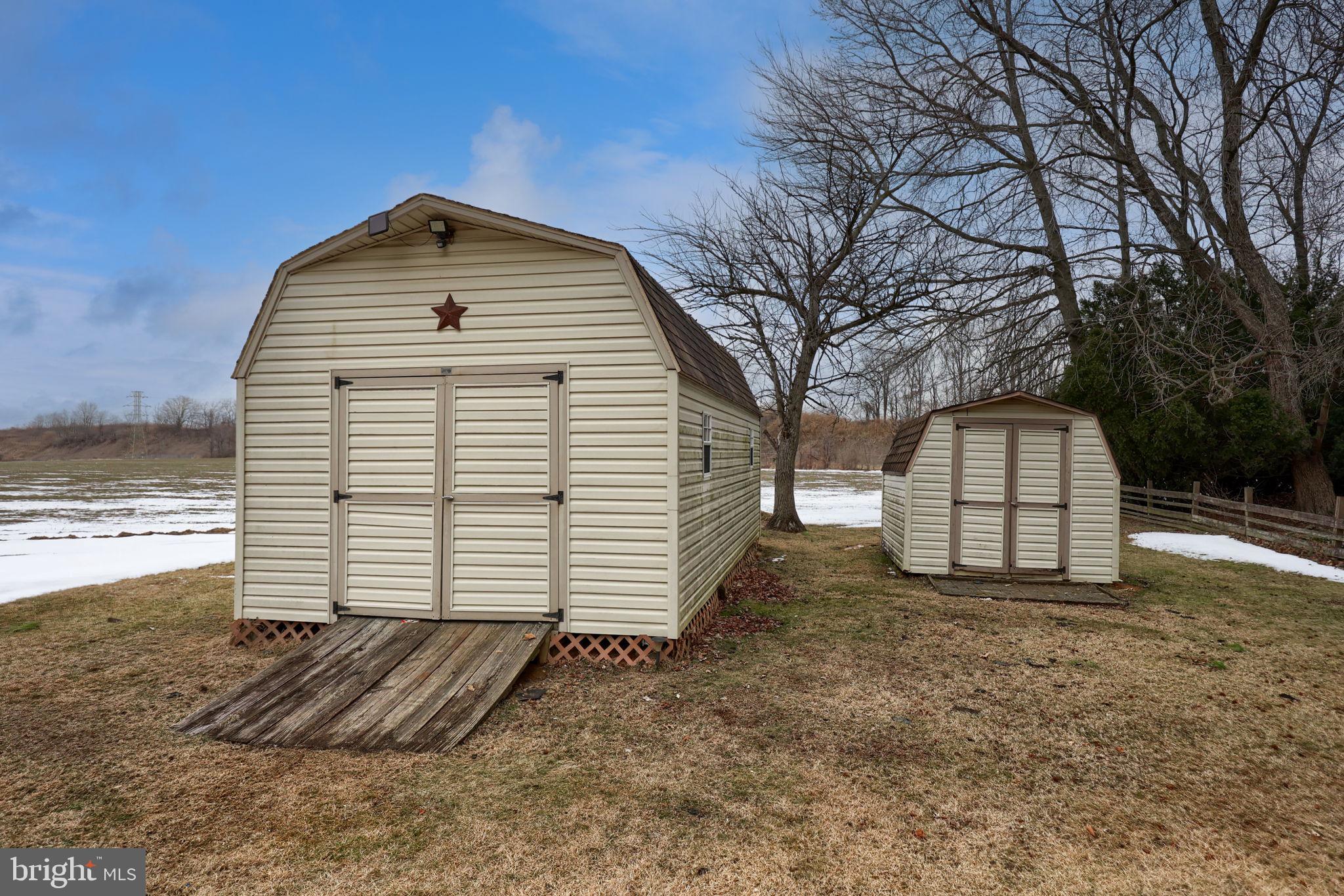 1297 Graystone Road Manheim, PA 17545 - Photo 28 of 29 a view of a backyard with a large tree