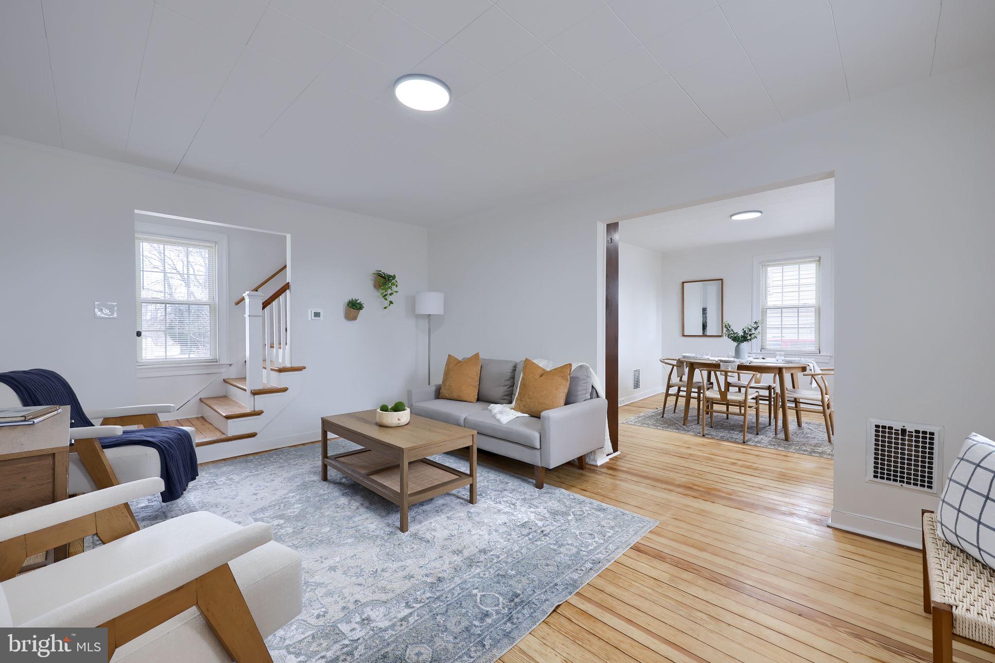 1297 Graystone Road Manheim, PA 17545 - Photo 3 of 29 a living room with furniture and wooden floor