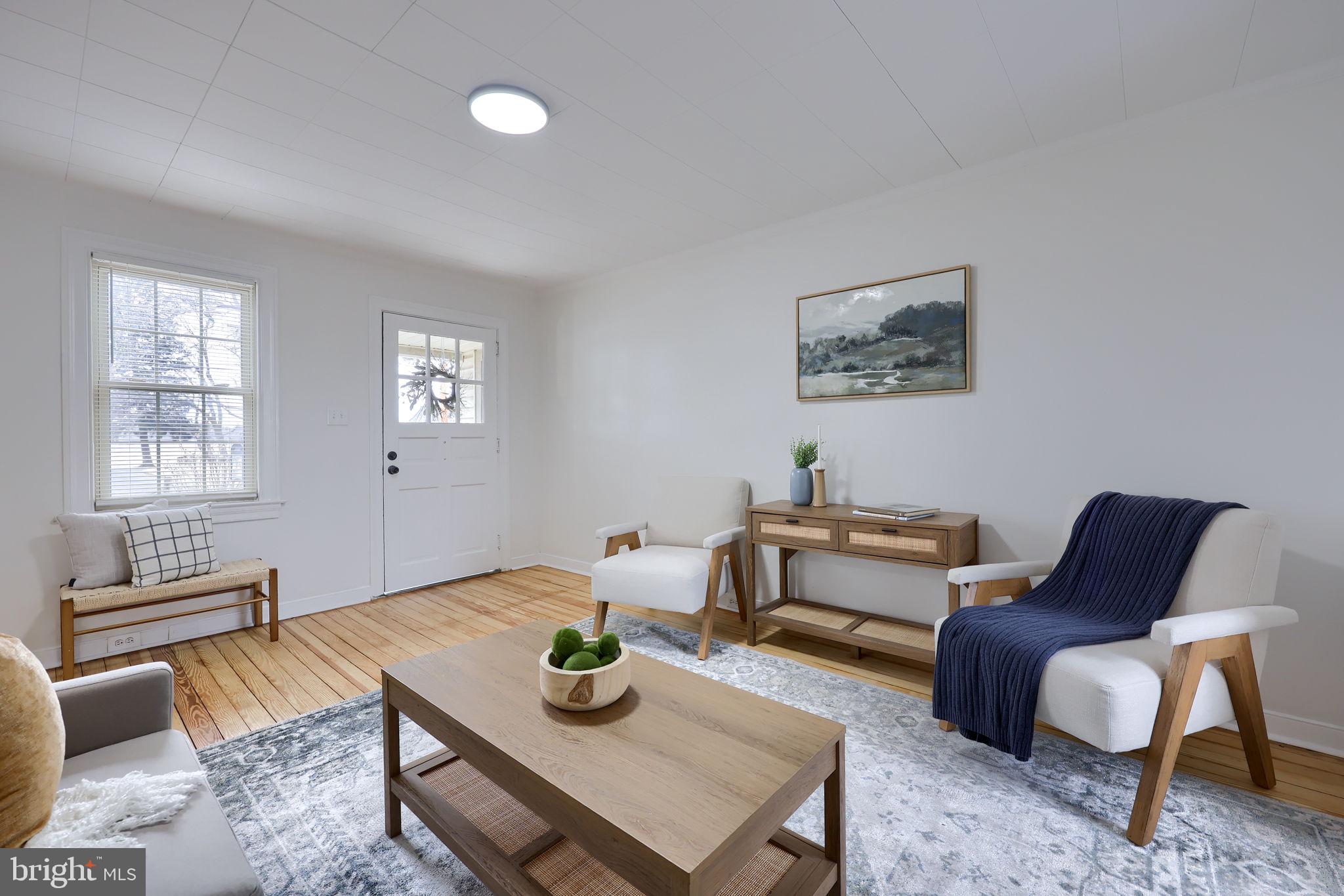 1297 Graystone Road Manheim, PA 17545 - Photo 5 of 29 a living room with furniture and a window
