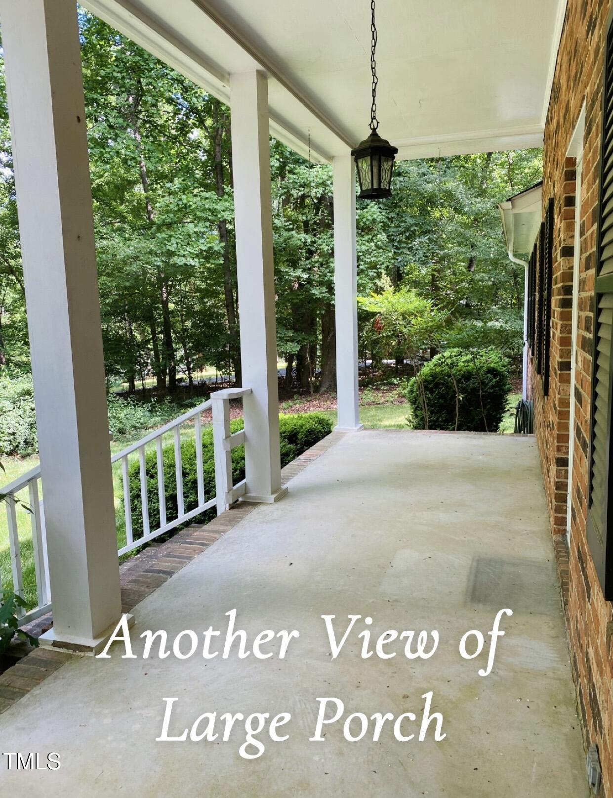 5825 Scalybark Road Durham, NC 27712 - Photo 25 of 44 a view of a street with sitting area