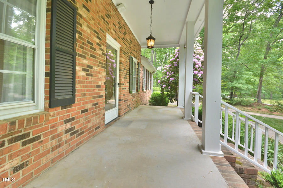 5825 Scalybark Road Durham, NC 27712 - Photo 3 of 44 a view of a garden from a windows