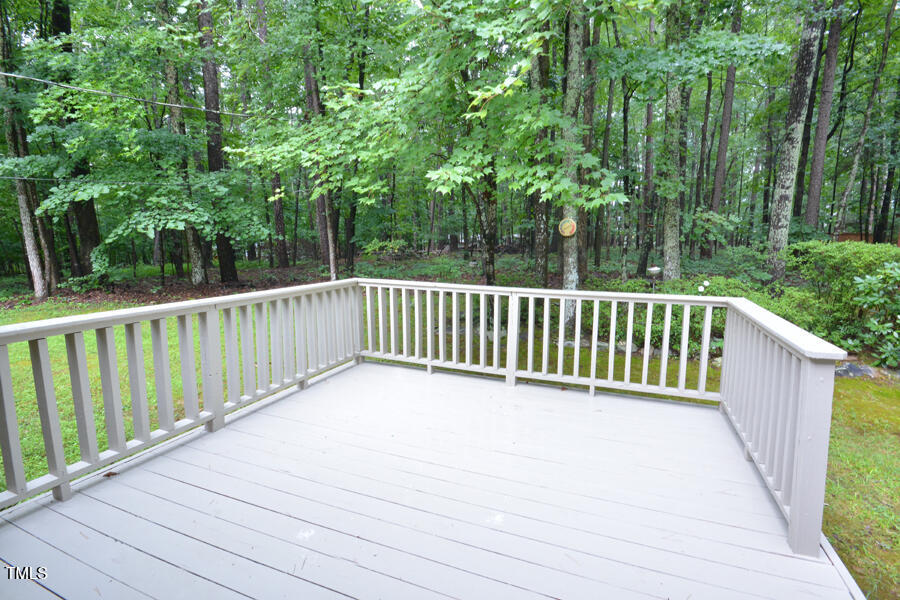 5825 Scalybark Road Durham, NC 27712 - Photo 10 of 44 a view of deck and a yard