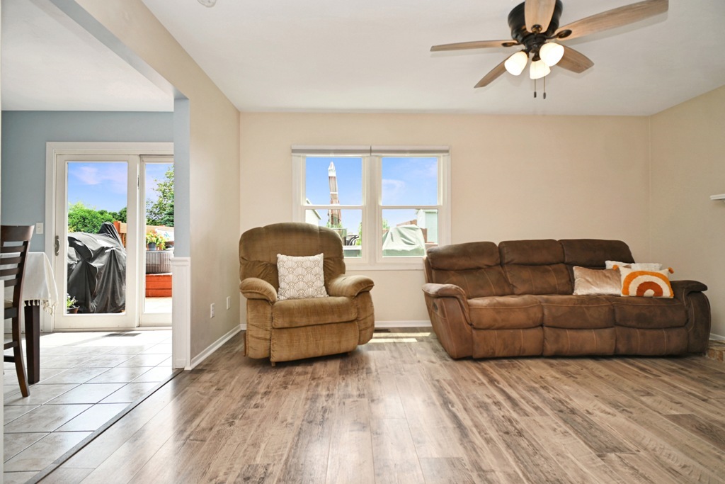 501 Carriage Hills Road Normal, IL 61761 - Photo 16 of 77 a living room with furniture and a window