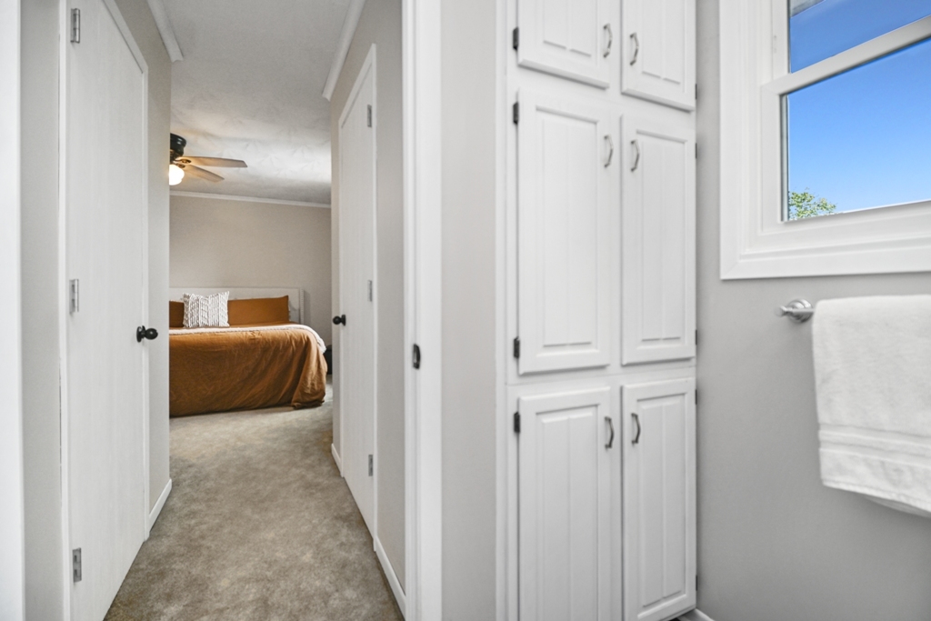 501 Carriage Hills Road Normal, IL 61761 - Photo 38 of 77 a view of a bedroom with bed and mirror