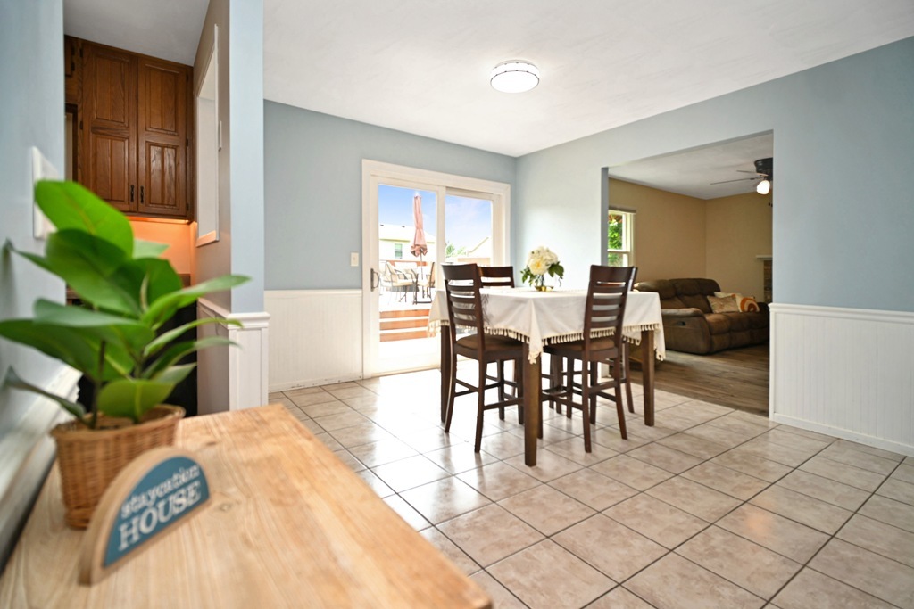 501 Carriage Hills Road Normal, IL 61761 - Photo 5 of 77 a view of a dining room with furniture