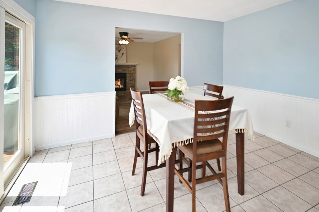 501 Carriage Hills Road Normal, IL 61761 - Photo 57 of 77 a dining room with furniture and window