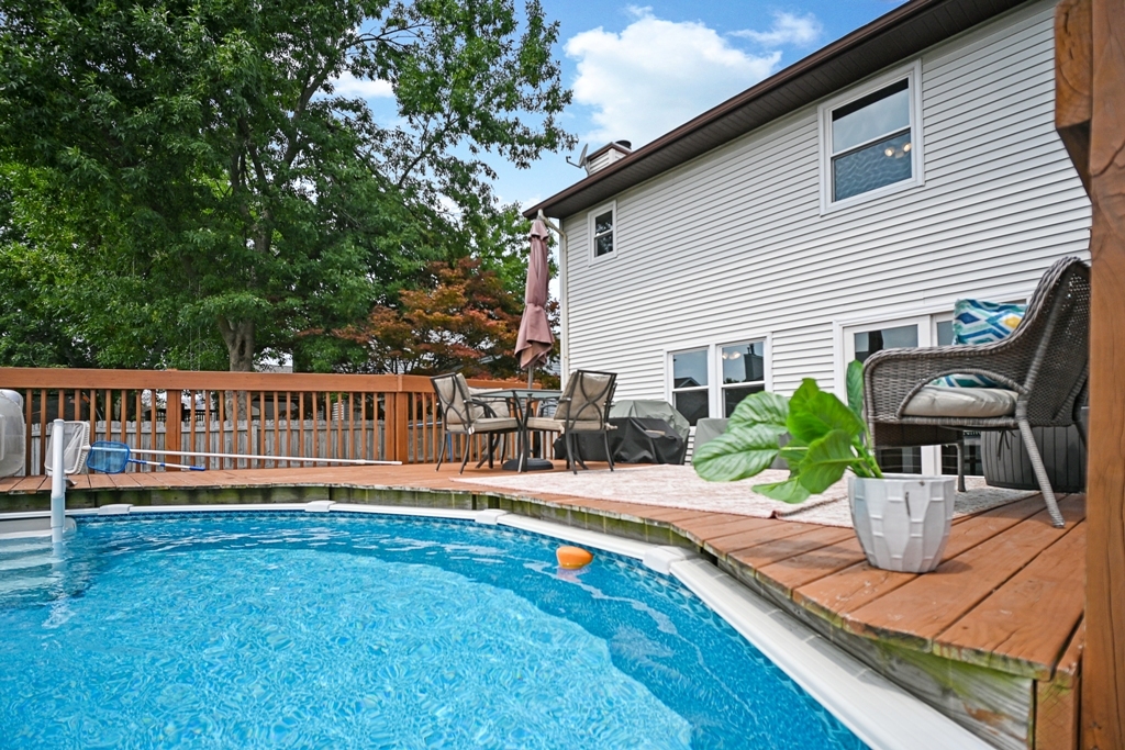 501 Carriage Hills Road Normal, IL 61761 - Photo 65 of 77 a view of a house with backyard and sitting area