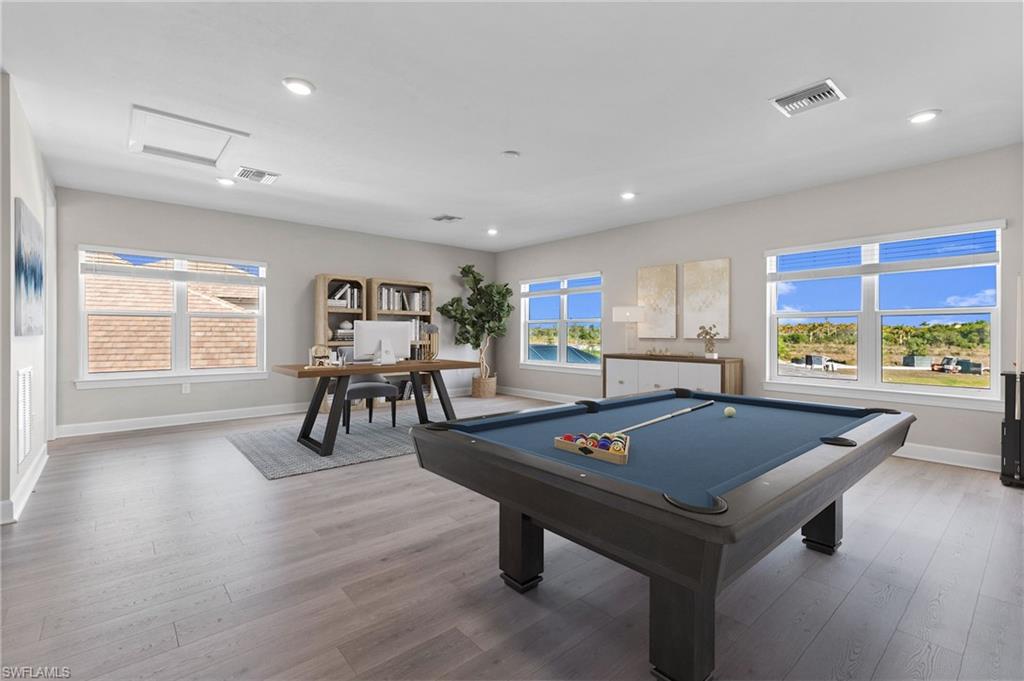 15564 Montello Lane Naples, FL 34114 - Photo 22 of 49 a room with furniture pool table and windows