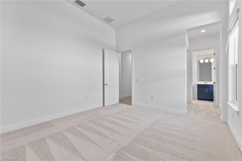 15564 Montello Lane Naples, FL 34114 - Photo 31 of 49 a view of an empty room