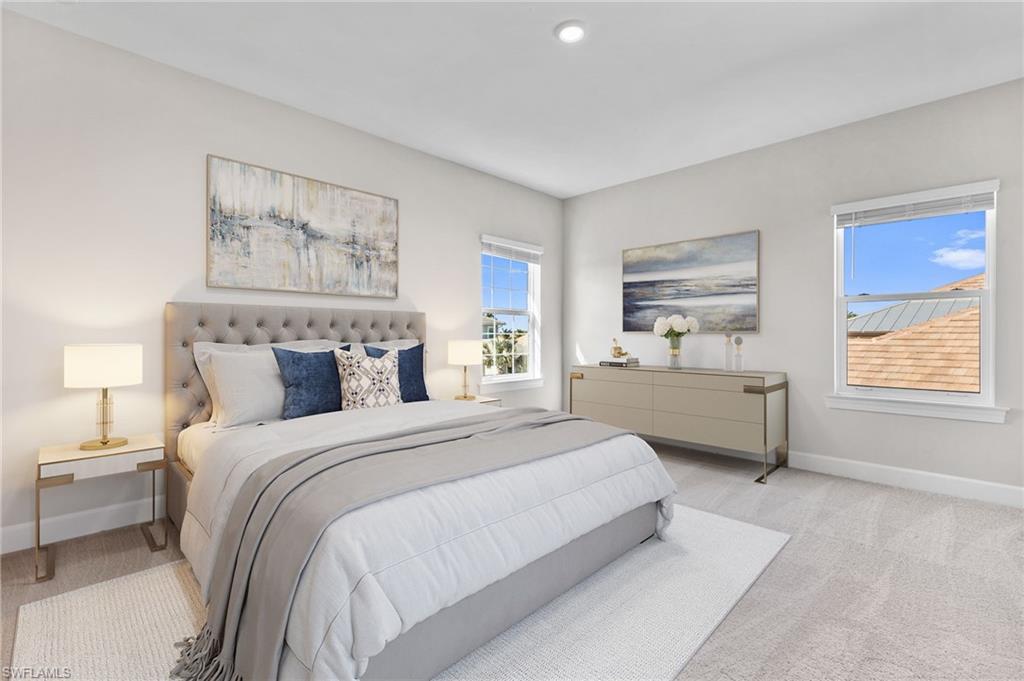 15564 Montello Lane Naples, FL 34114 - Photo 40 of 49 a bedroom with a bed and a large window