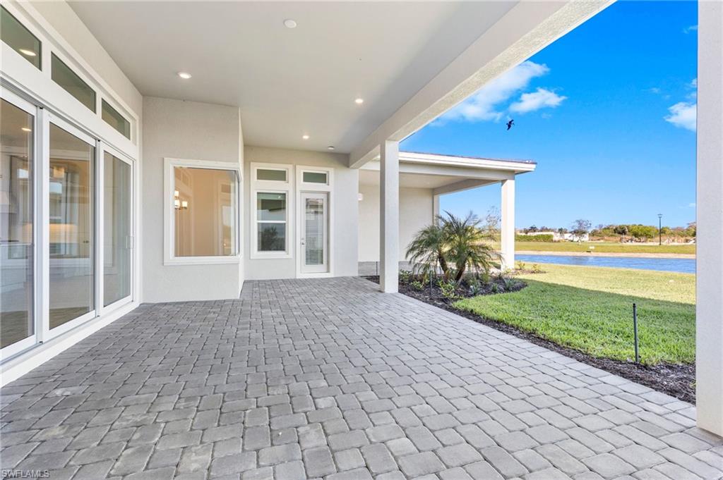 15564 Montello Lane Naples, FL 34114 - Photo 42 of 49 a view of a porch