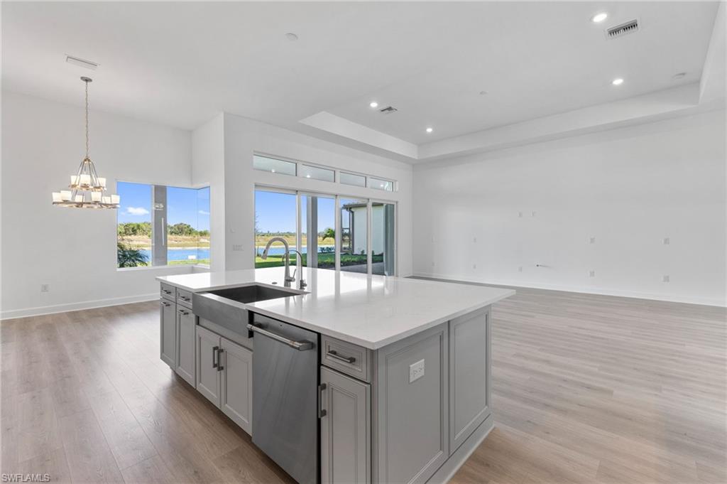 15564 Montello Lane Naples, FL 34114 - Photo 9 of 49 a room with sink and window
