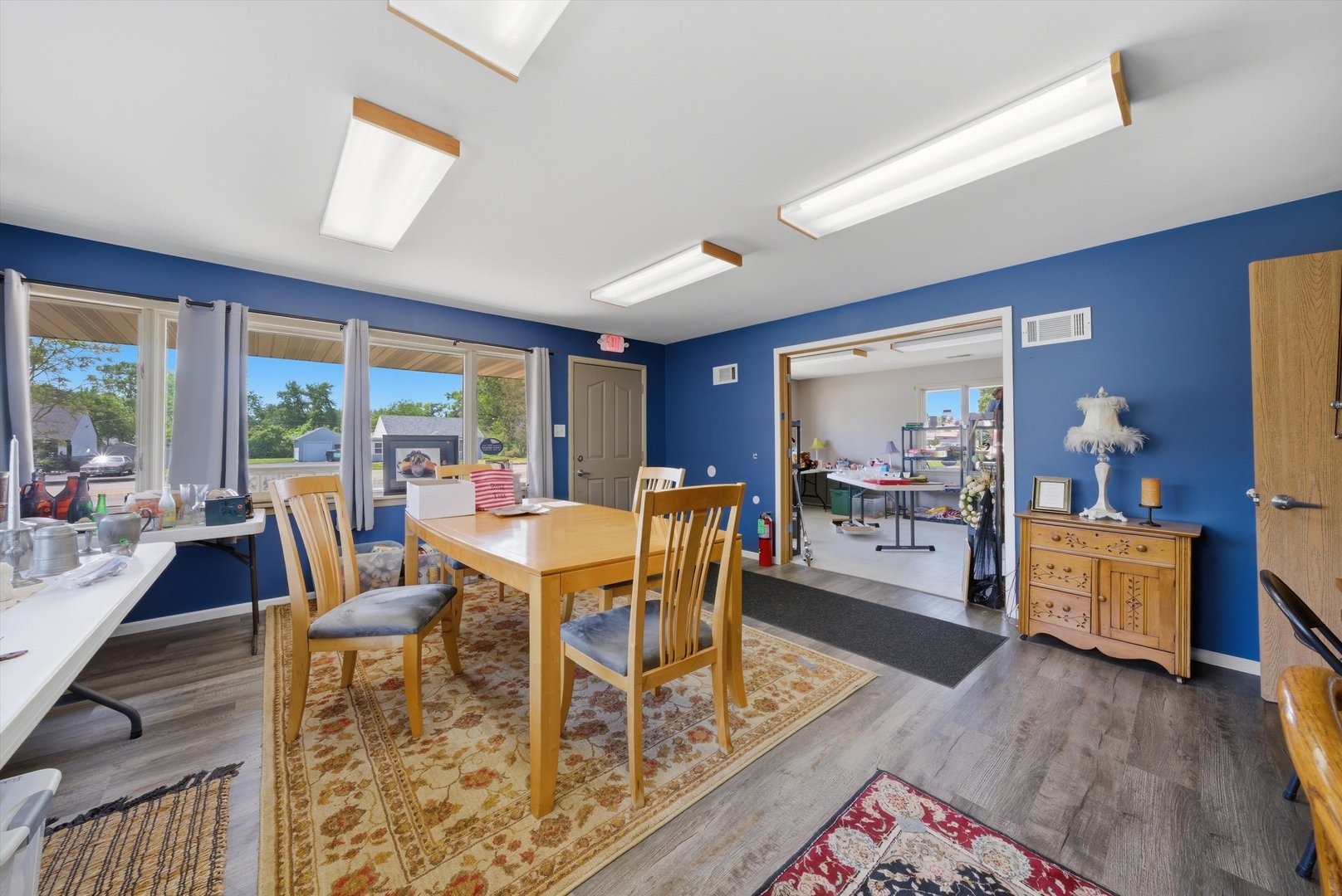 2304 Plainfield Road Crest Hill, IL 60403 - Photo 6 of 56 a dining room with wooden floor and a rug