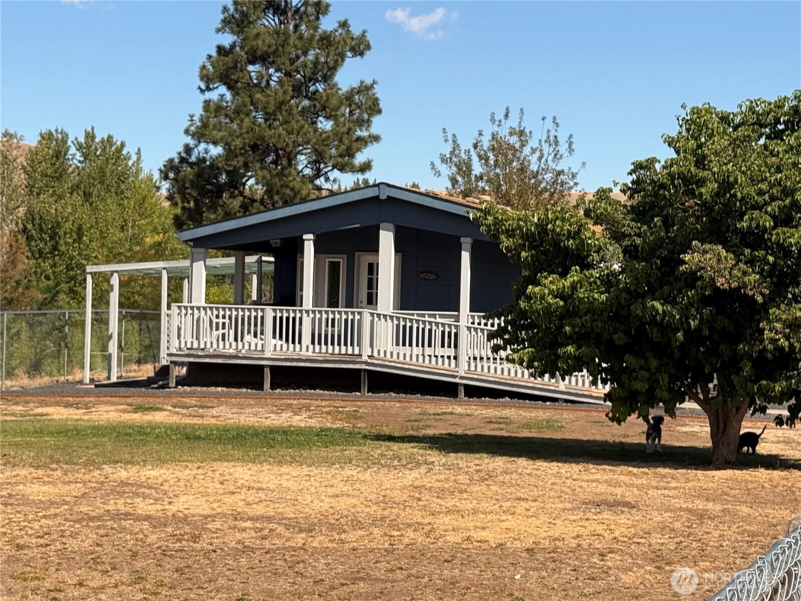 1934 Tucannon Road Pomeroy, WA 99347 - Photo 1 of 40 a view of a house with a swimming pool