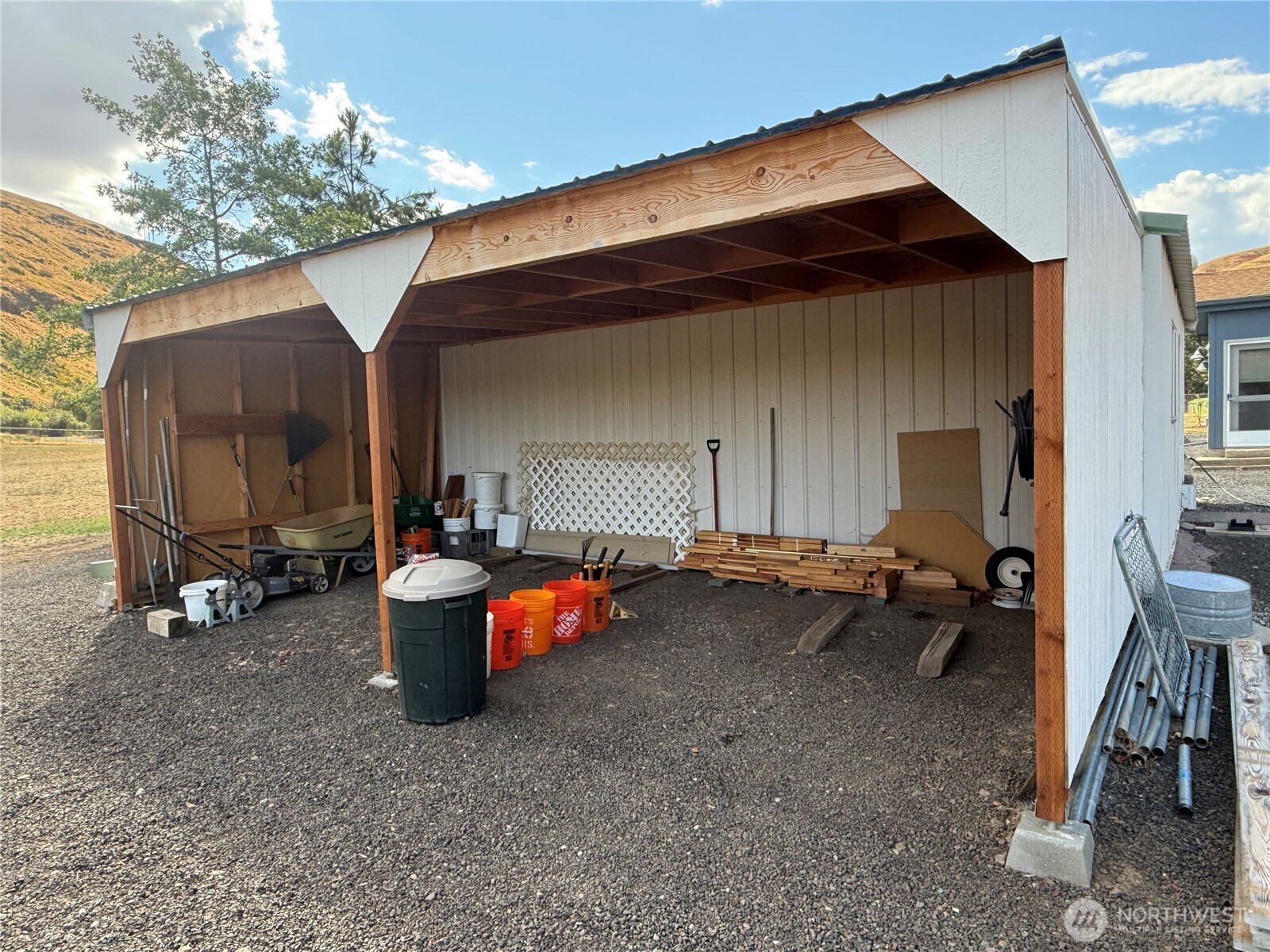 1934 Tucannon Road Pomeroy, WA 99347 - Photo 36 of 40 a backyard of a house with outdoor seating