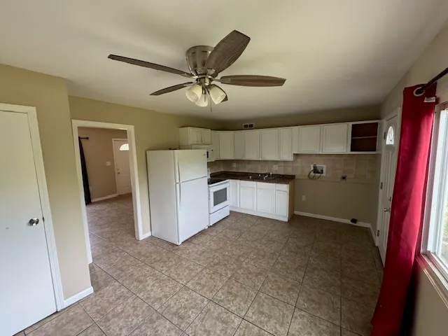 an empty room with a natural light