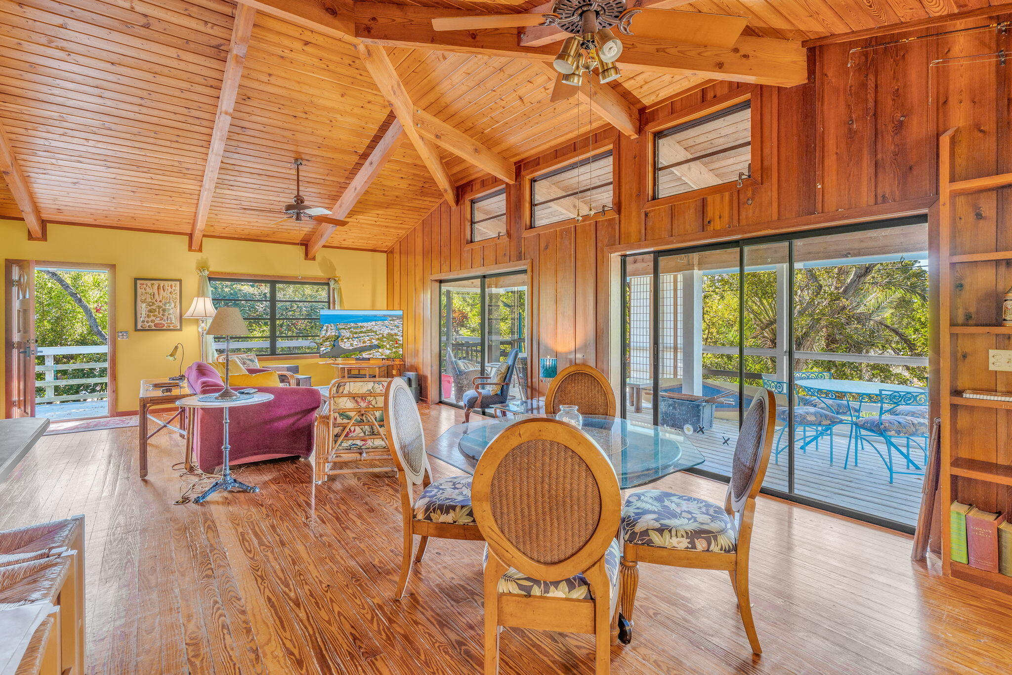 708 North Lake Drive Key Largo, FL 33037 - Photo 19 of 40 a dining room with furniture water view and wooden floor