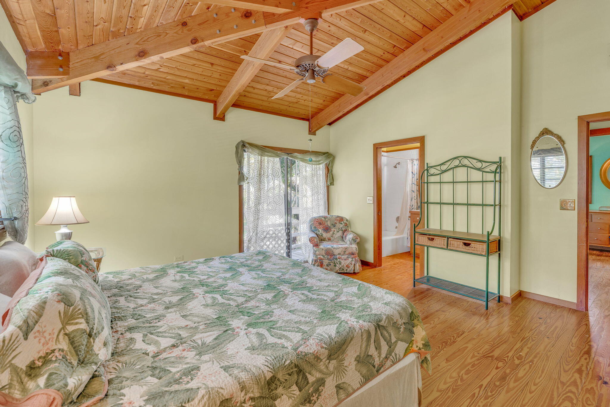 708 North Lake Drive Key Largo, FL 33037 - Photo 22 of 40 a bed sitting in a bedroom next to a window