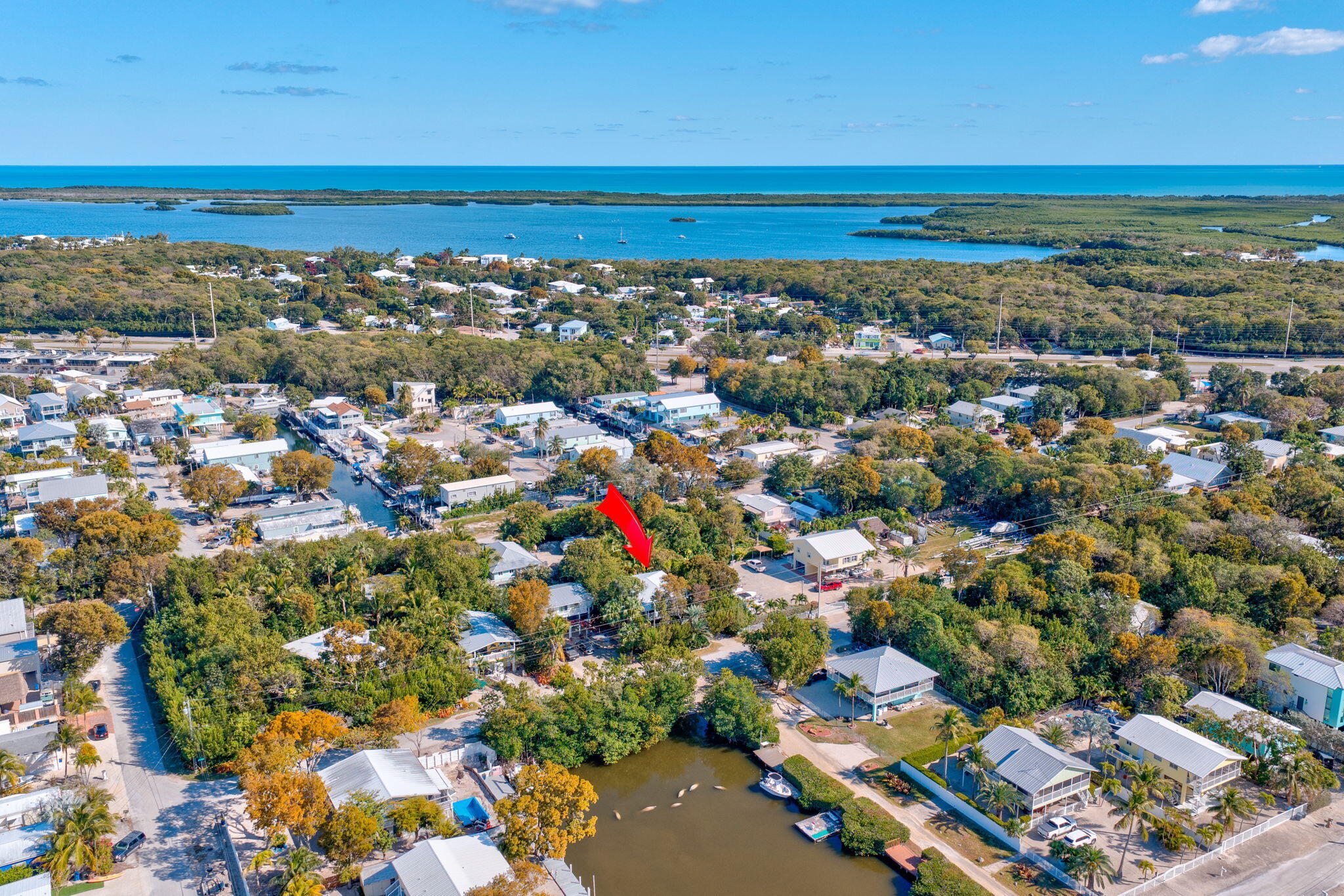 708 North Lake Drive Key Largo, FL 33037 - Photo 29 of 40 an aerial view of residential building and ocean